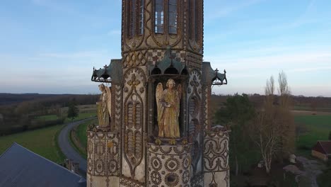 Aerial-drone-view-flying-around-a-chapel-in-a-small-village-in-France.-Angels